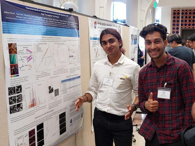 Ayan and Adi present their poster